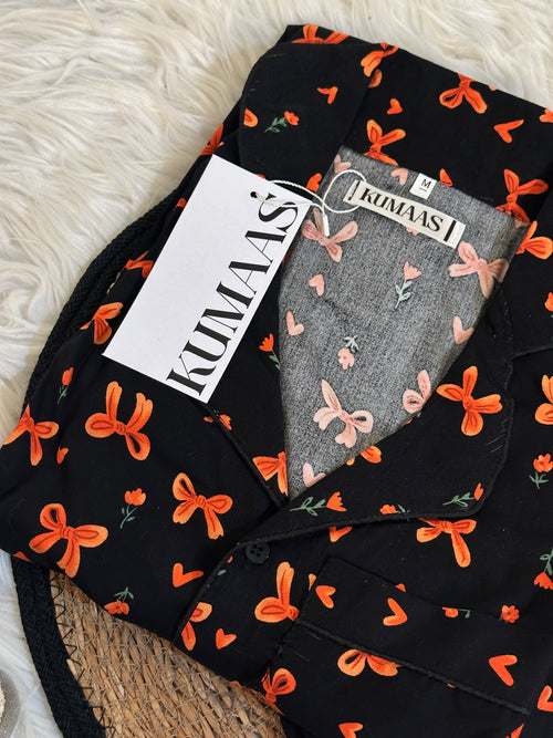 Black bow pjs.